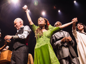 Amber Gray, Patrick Page and the company of Hadestown take in the crowd.