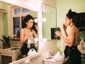 Tony nominee and new mother Amber Gray does double duty between scenes.